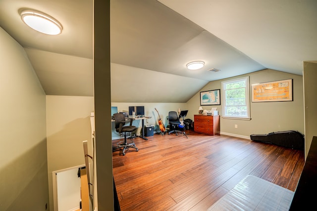 office area with lofted ceiling and wood-type flooring