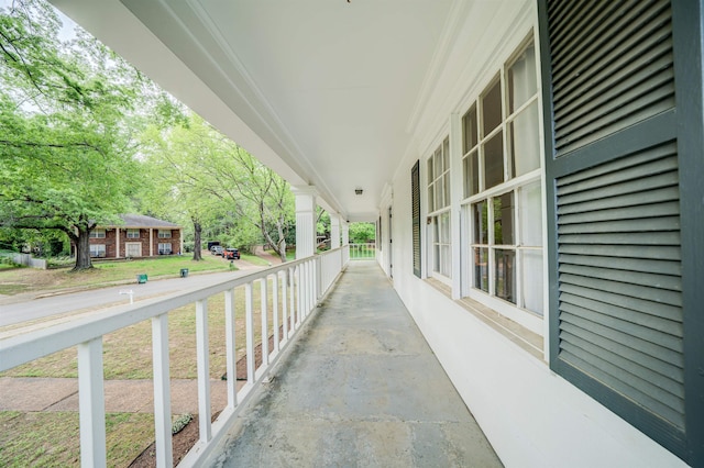 balcony featuring a porch