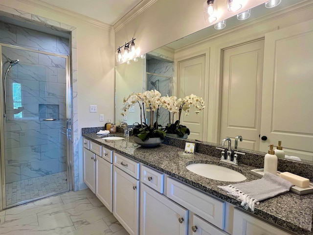 bathroom featuring large vanity, tile flooring, an enclosed shower, ornamental molding, and dual sinks