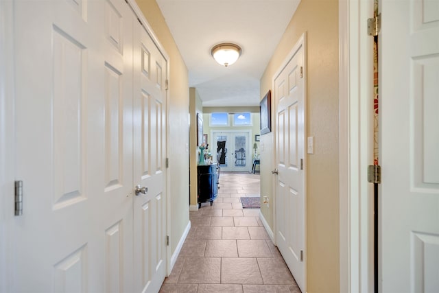 corridor featuring tile floors