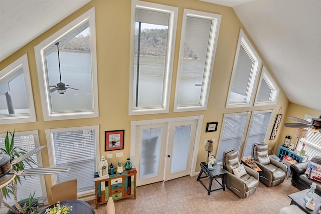 interior space featuring french doors and ceiling fan