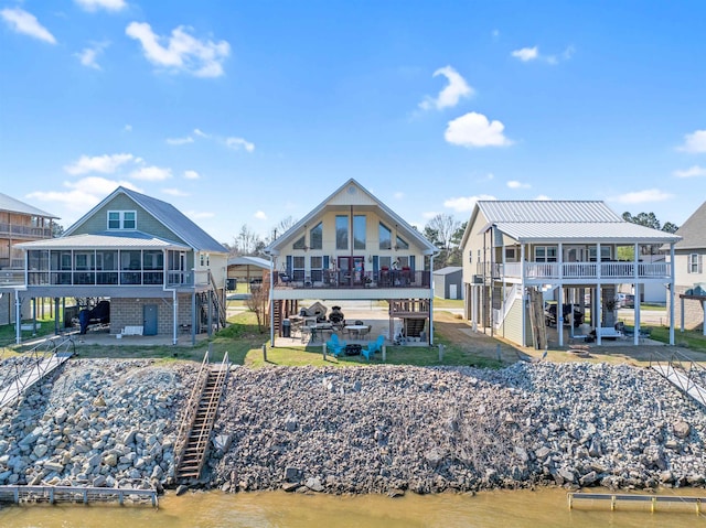 exterior space with a water view