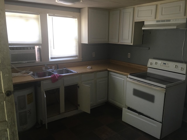 2965 Lotus Rd, Memphis, TN 38109 - kitchen featuring plenty of natural light, electric stove, white cabinetry, and sink