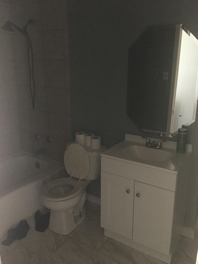 2965 Lotus Rd, Memphis, TN 38109 - full bathroom with tile flooring, oversized vanity, tiled shower / bath combo, and toilet