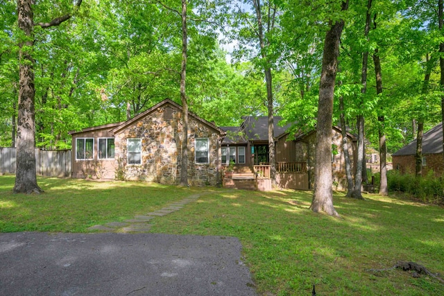 ranch-style house with a front yard