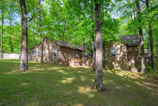 view of yard with a deck