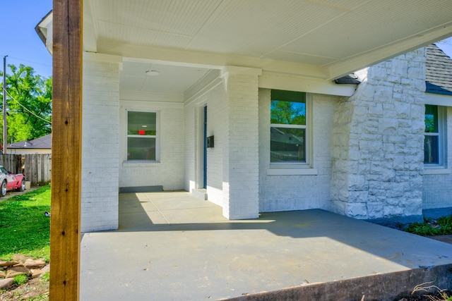 property entrance with a patio