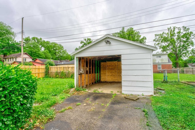 view of outdoor structure featuring a lawn