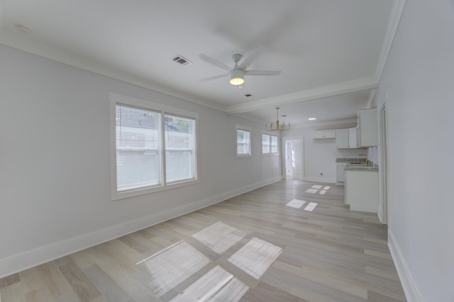 interior space featuring crown molding, light hardwood / wood-style floors, and ceiling fan