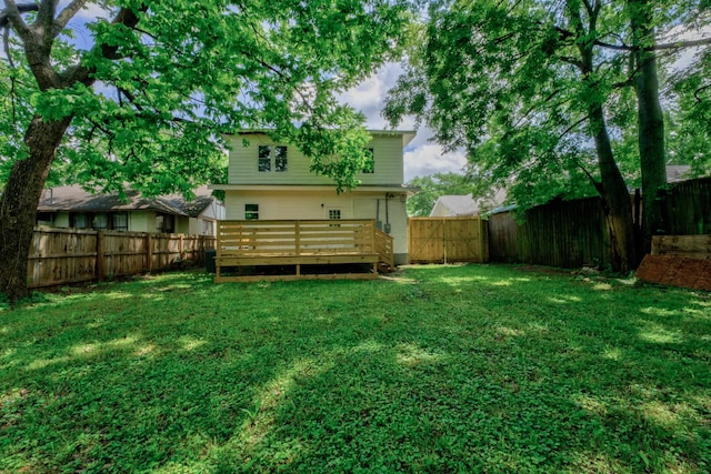 view of yard featuring a wooden deck