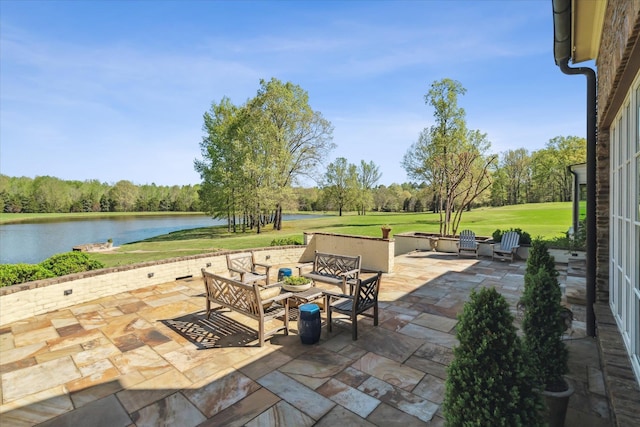 view of terrace featuring a water view and an outdoor hangout area