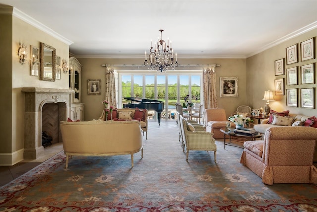 living room featuring crown molding, a fireplace, and an inviting chandelier