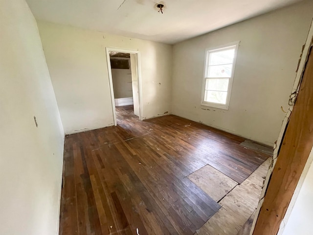 empty room featuring hardwood / wood-style flooring