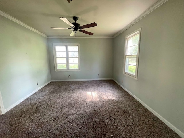 spare room with ornamental molding, carpet flooring, a healthy amount of sunlight, and ceiling fan