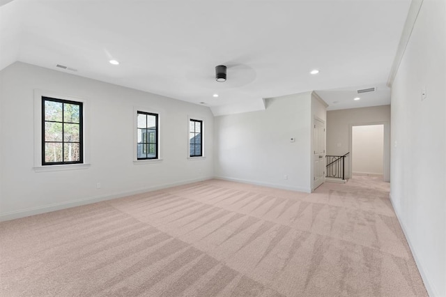 empty room with light colored carpet