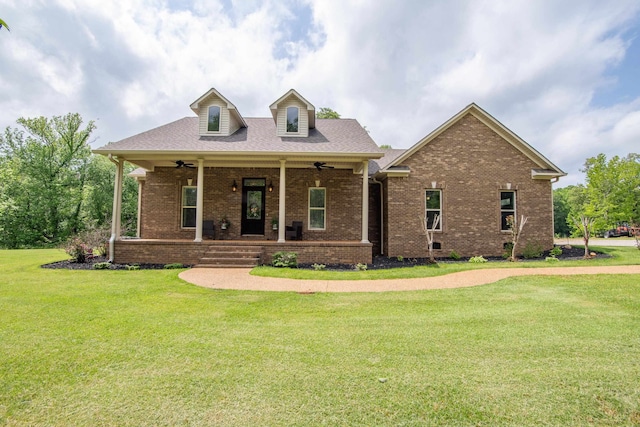 view of front of house with a front yard and a porch