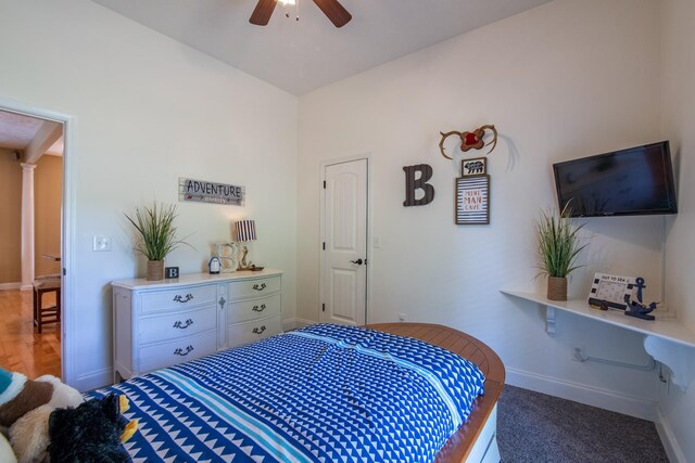 bedroom with wood-type flooring and ceiling fan