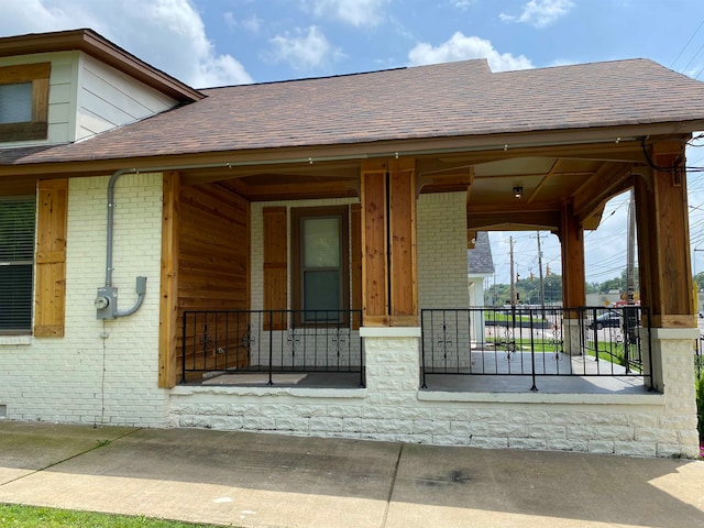 entrance to property with a porch