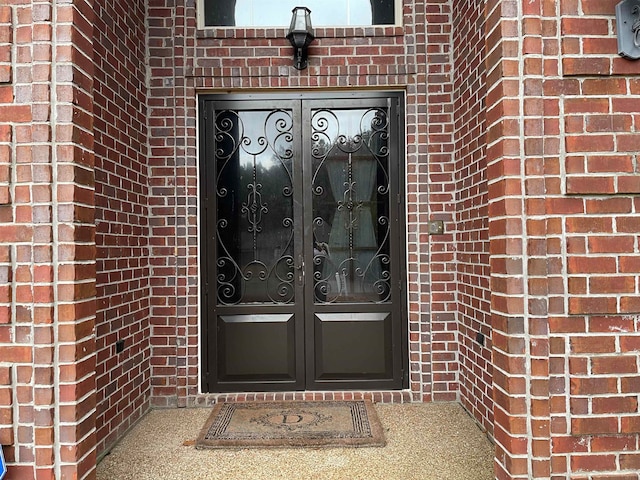 entrance to property featuring french doors