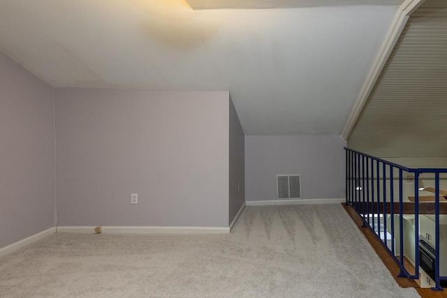 bonus room featuring carpet