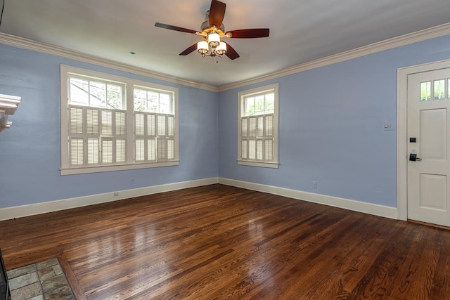 spare room with dark hardwood / wood-style floors, ceiling fan, and crown molding