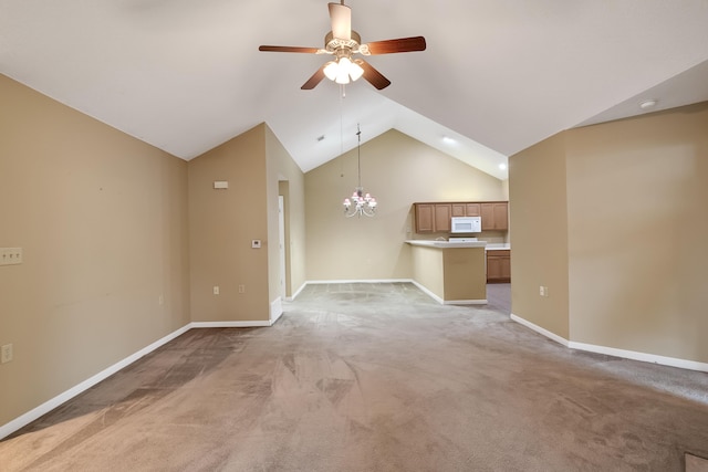 additional living space featuring ceiling fan with notable chandelier, carpet flooring, and lofted ceiling