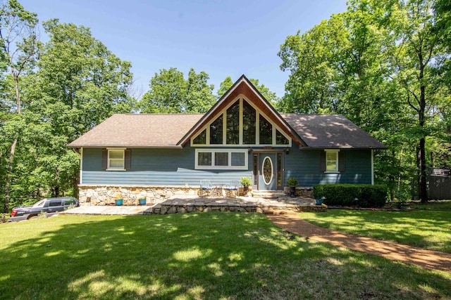 view of front of home with a front yard