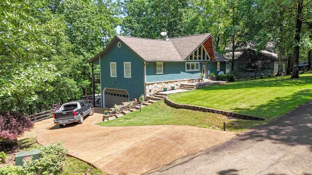 exterior space featuring a front lawn and a garage