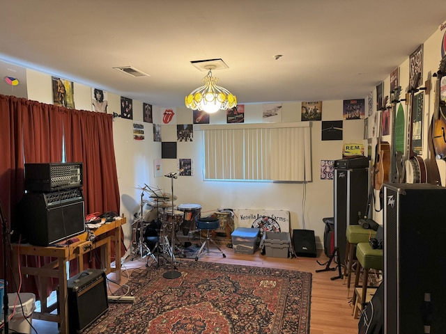 home office with wood-type flooring