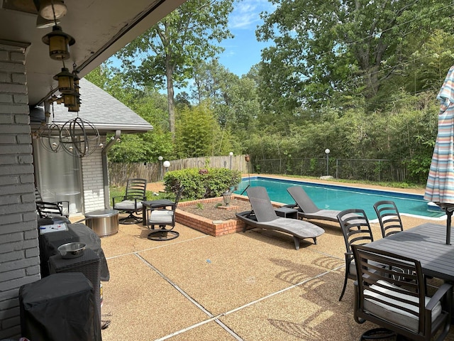 view of pool featuring a patio