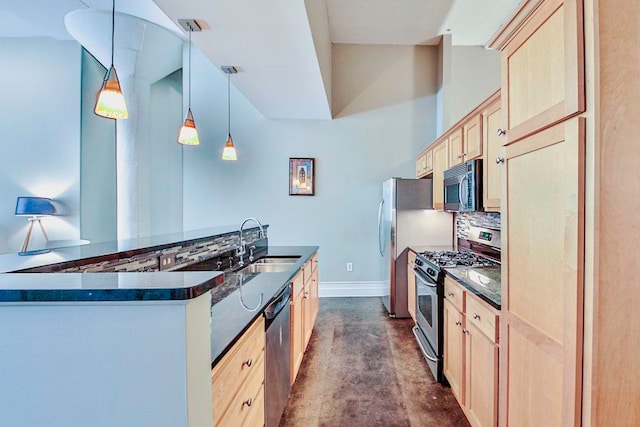 kitchen featuring hanging light fixtures, light brown cabinets, stainless steel appliances, sink, and tasteful backsplash