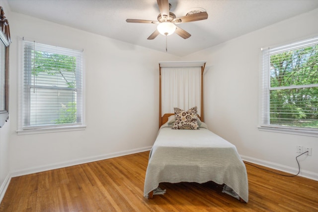 bedroom featuring ceiling fan and hardwood / wood-style floors