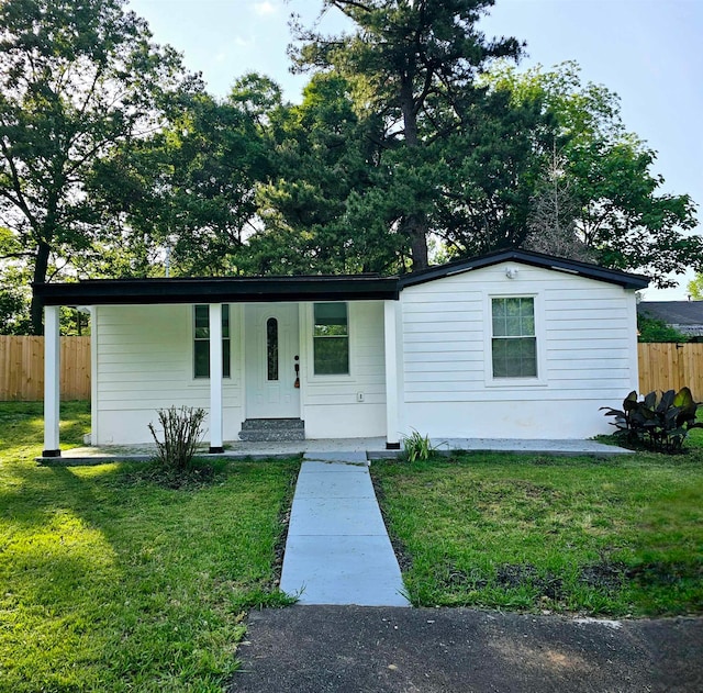 5907 Old Millington Rd, Millington, TN 38053 - ranch-style house featuring a front lawn and covered porch