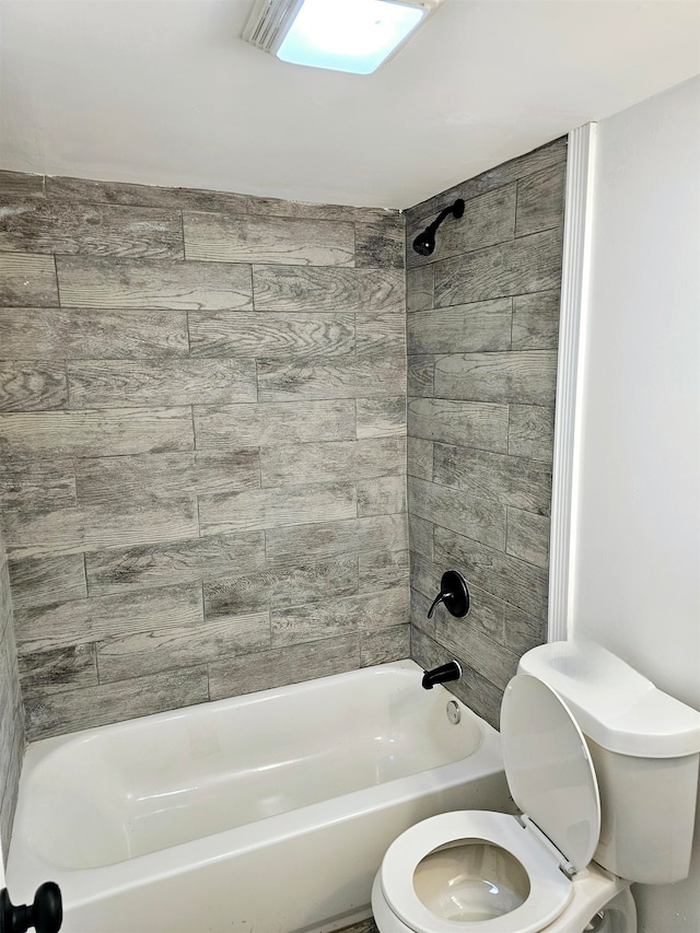 5907 Old Millington Rd, Millington, TN 38053 - bathroom featuring toilet and tiled shower / bath