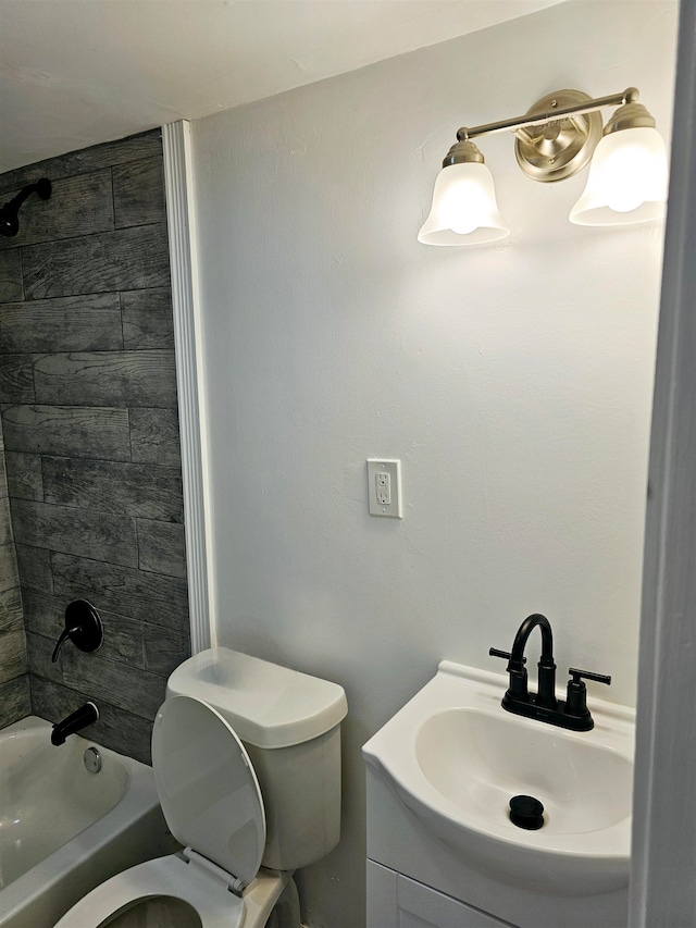 5907 Old Millington Rd, Millington, TN 38053 - full bathroom with toilet, vanity, and tiled shower / bath