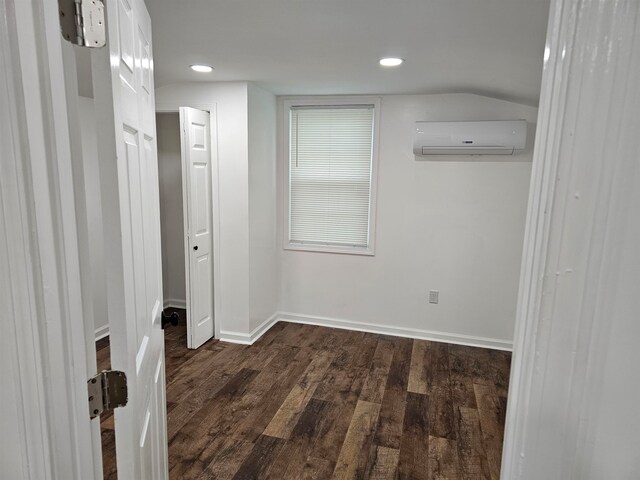 5907 Old Millington Rd, Millington, TN 38053 - interior space featuring a wall mounted air conditioner and dark hardwood / wood-style floors