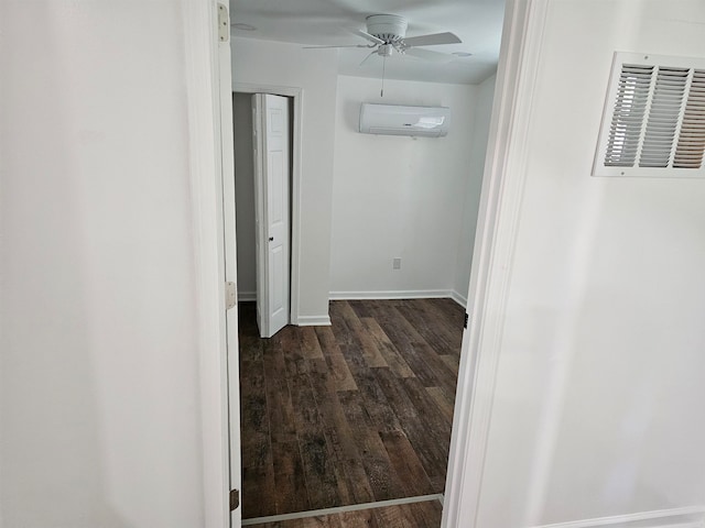 5907 Old Millington Rd, Millington, TN 38053 - corridor with dark hardwood / wood-style flooring and a wall unit AC