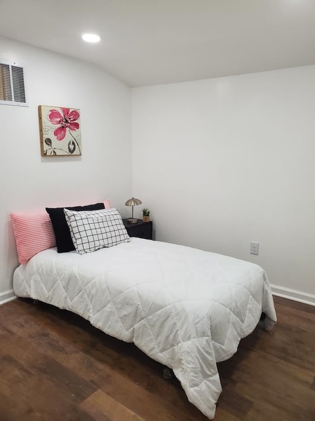 5907 Old Millington Rd, Millington, TN 38053 - bedroom with dark wood-type flooring