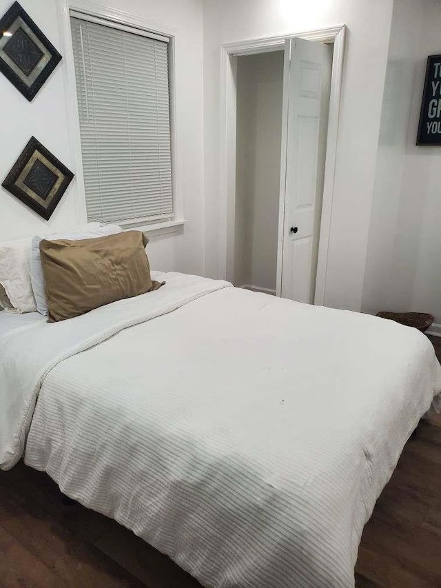 5907 Old Millington Rd, Millington, TN 38053 - bedroom featuring dark hardwood / wood-style floors