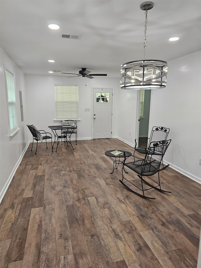 5907 Old Millington Rd, Millington, TN 38053 - sitting room with ceiling fan with notable chandelier and dark wood-type flooring