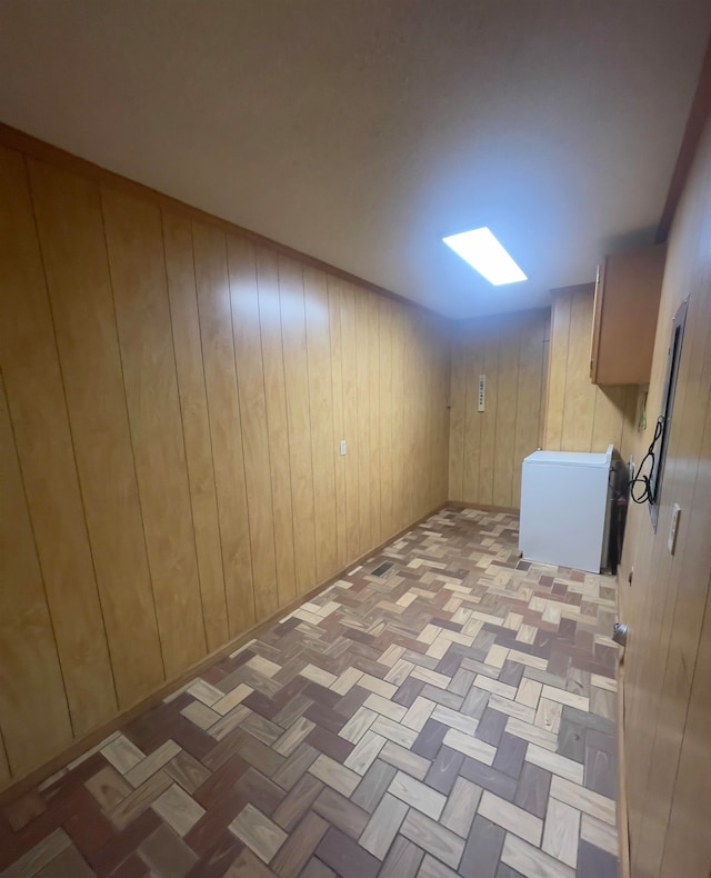 basement with wood walls