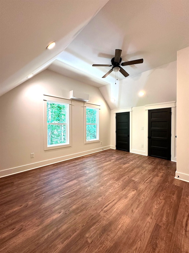 unfurnished living room featuring ceiling fan, lofted ceiling, and dark wood-type flooring