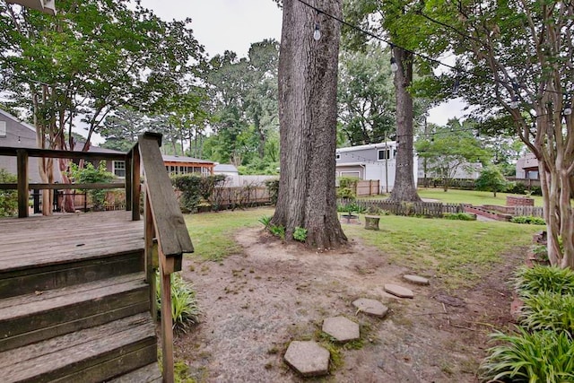 view of yard featuring a wooden deck