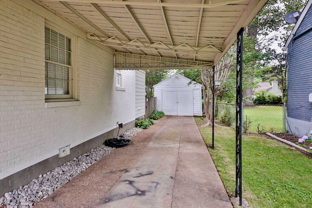 view of terrace with a shed