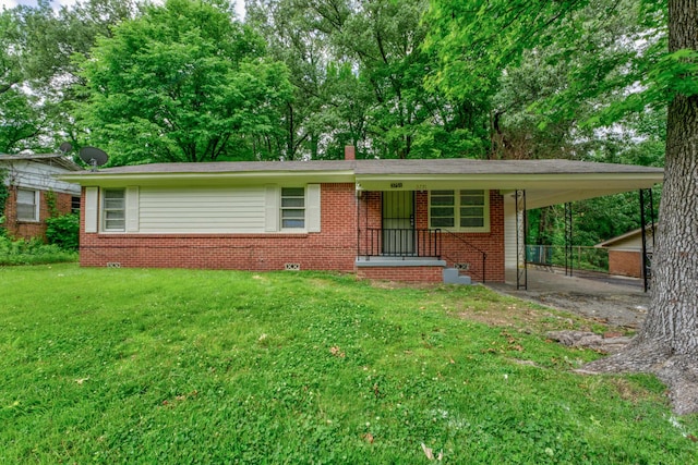 single story home featuring a carport and a front lawn