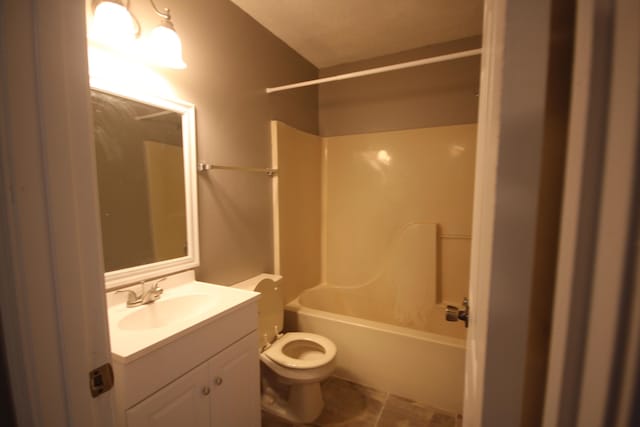 full bathroom featuring tile flooring, shower / washtub combination, vanity, and toilet