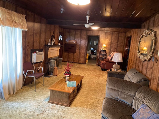 living room with wood walls, carpet, ceiling fan, and wood ceiling