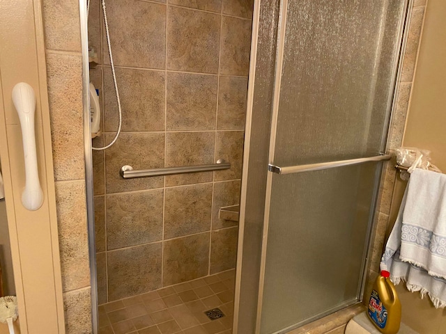 bathroom featuring an enclosed shower