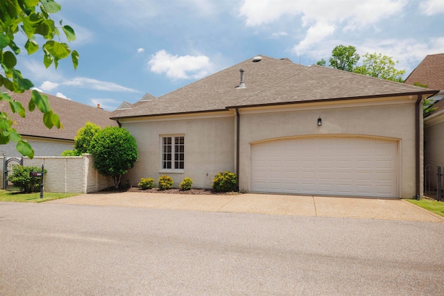 exterior space with a garage