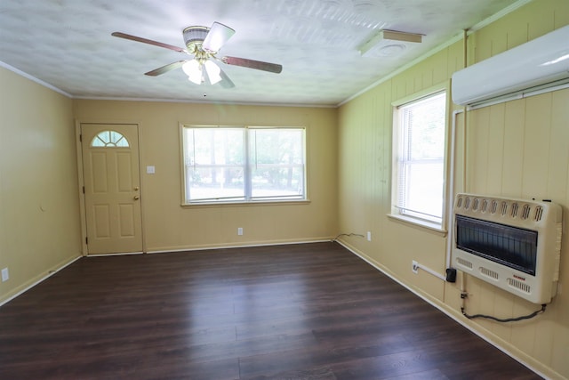 unfurnished living room featuring crown molding, dark hardwood / wood-style floors, and ceiling fan